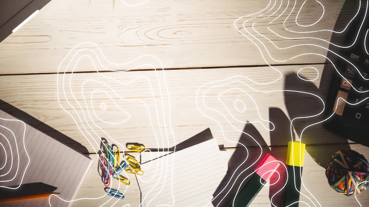 책상 에 있는 노트북 위 에 움직이는 선 들 의 애니메이션