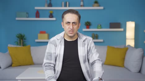 man getting angry at camera.