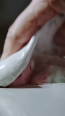 playing with pink and white slime