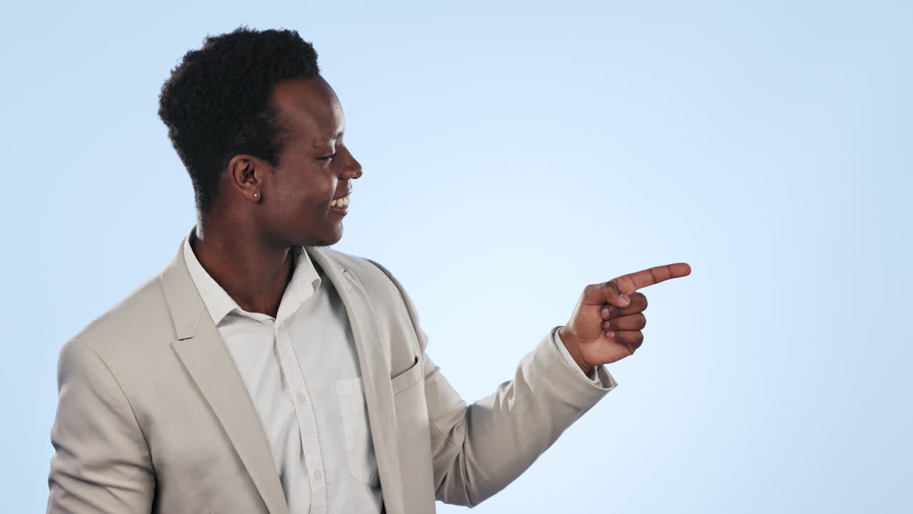 Happy businessman, pointing