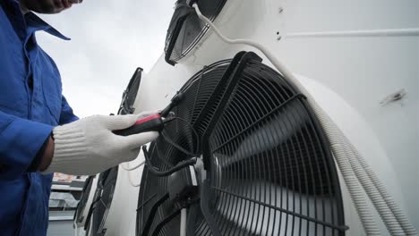 testing with an anemometer of an axial fan of the condensing unit