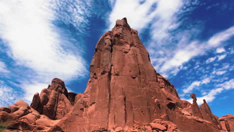 a red sandstone monument in the desert  time lapse 1