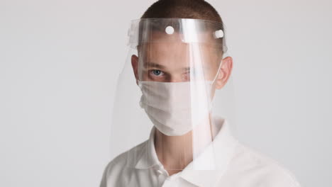 blond guy wearing two protective masks