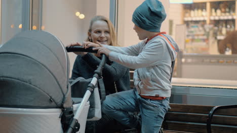 mum with two kids outdoor in the city