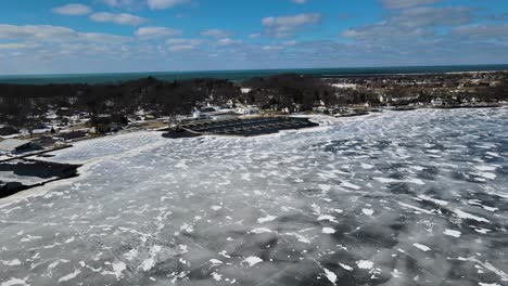 push forward and tracking the muskegon lake shoreline in late winter