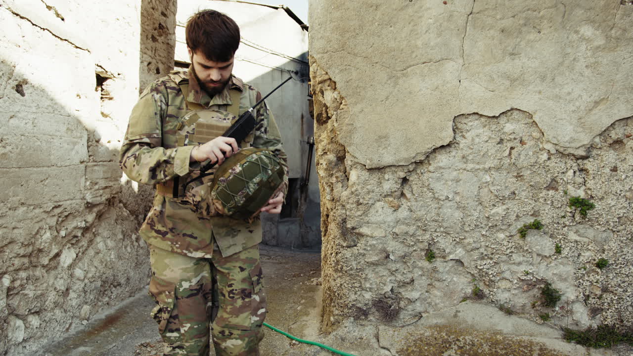 Soldier Arrives In The Narrow Alleys Of A Town At War