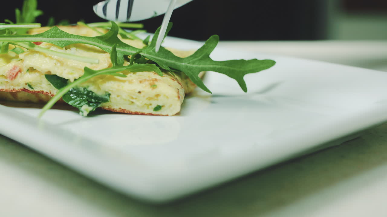 Slicing Omelet with Rocket, Salmon, and Zucchini