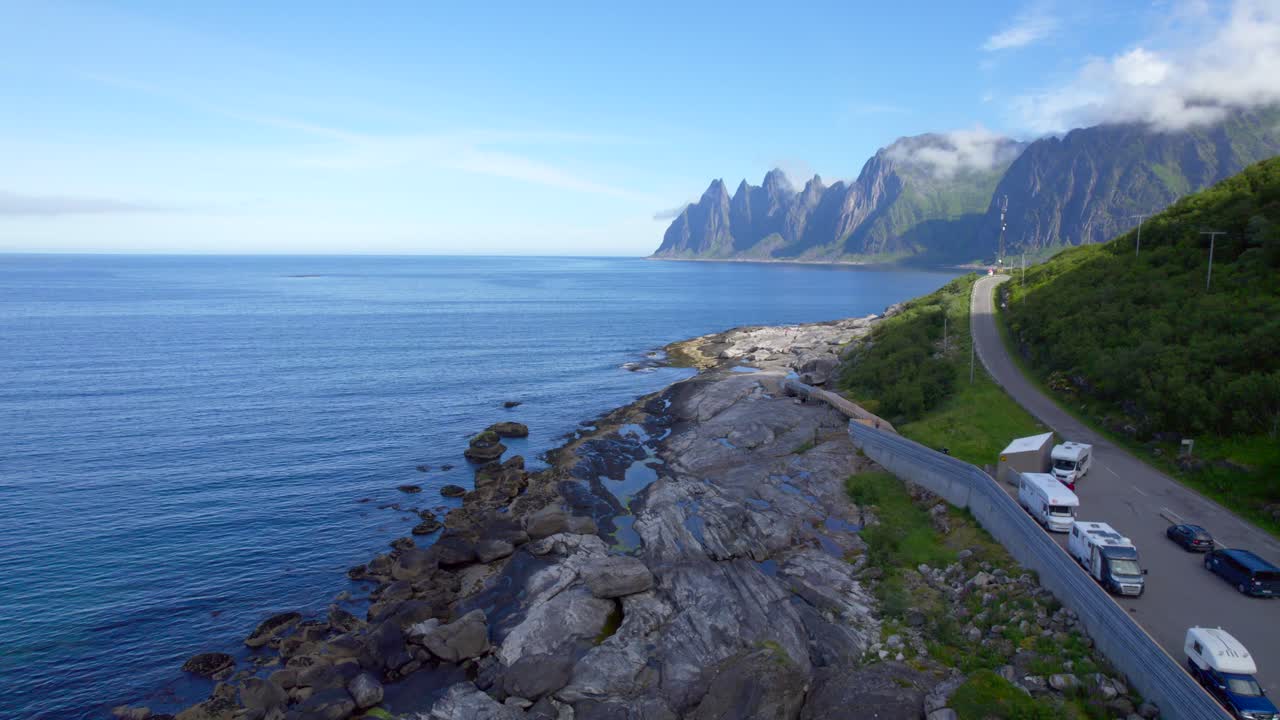 Aerial forward dolly shot of the famous Tungeneset Senja Island from a turnoff along the scenic route to Devil's Jaw