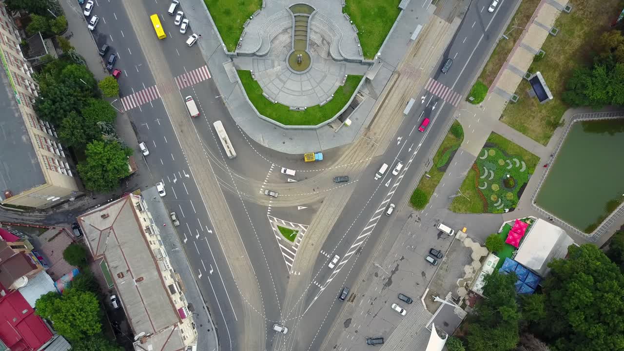 Crossroads In City Center. Aerial top view of traffic and vehicle car on crossroad