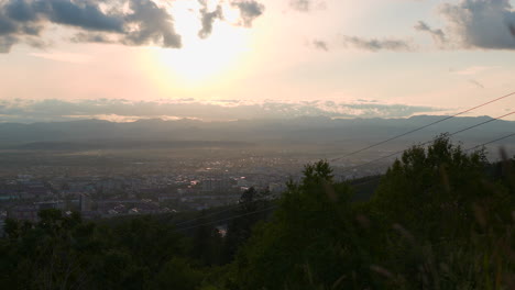 sunset view of city with mountains