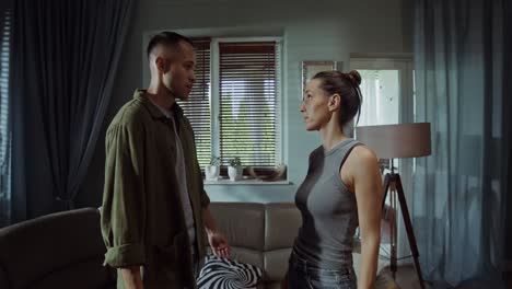 couple arguing in living room