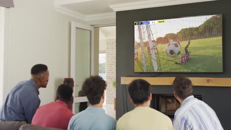 Vídeo-De-Un-Grupo-Diverso-De-Amigos-Sentados-En-El-Sofá-Viendo-Un-Partido-De-Fútbol