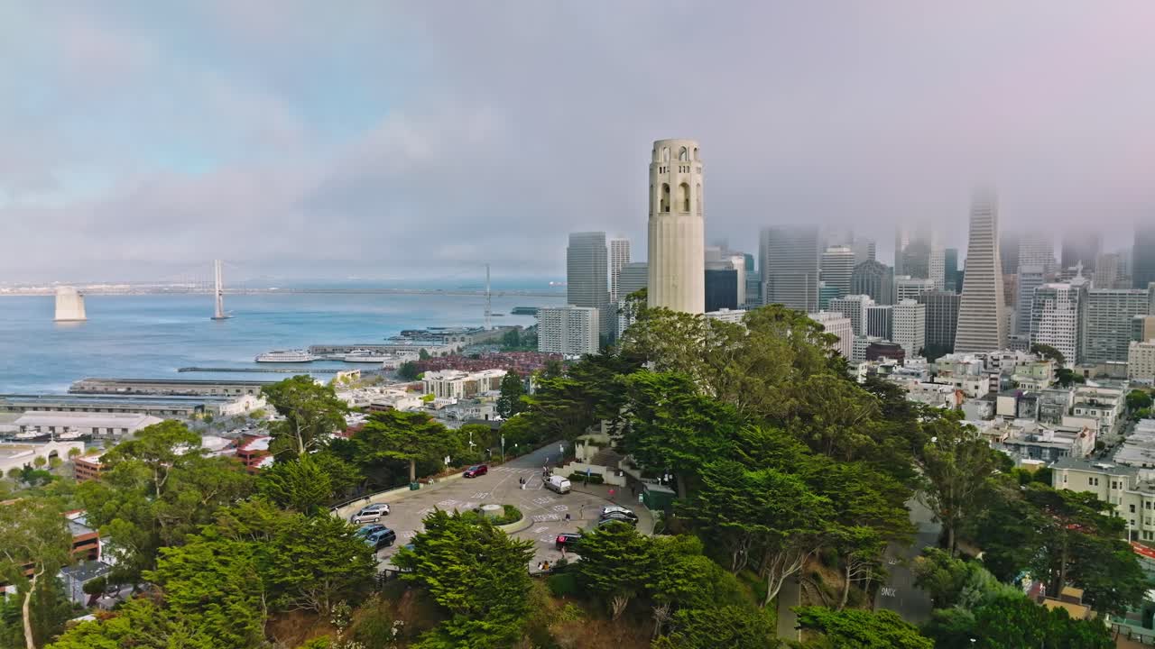 San Francisco cityscape with white tall historic building of Coit Tower