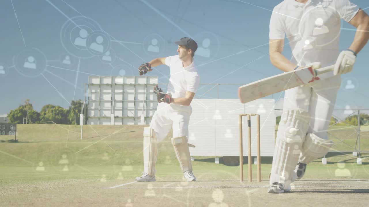 Ball incoming, batsman playing shot while keeper rising, fielding ball, cricket overlays appearing