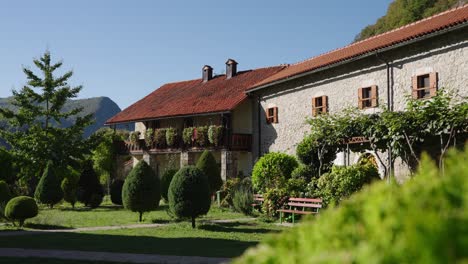 Rustic Building and Garden of Moraca Monastery on a Sunny Day
