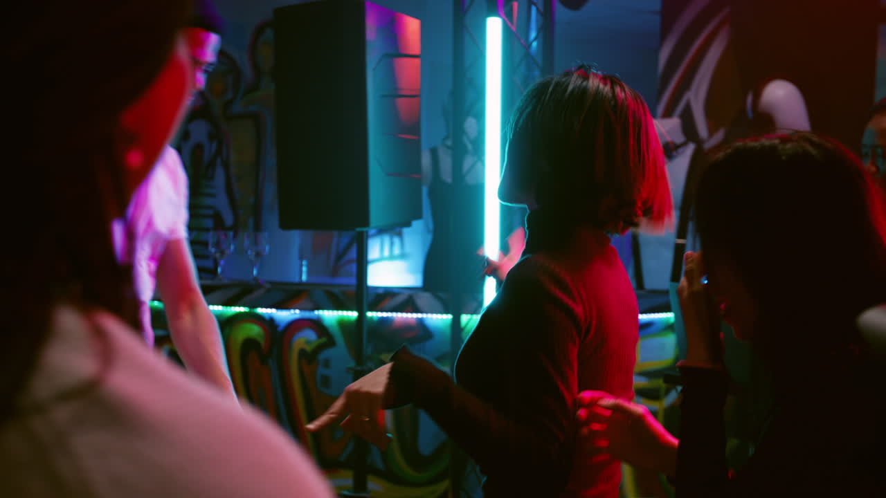 Party in a Nightclub with Dancing and Neon Lights