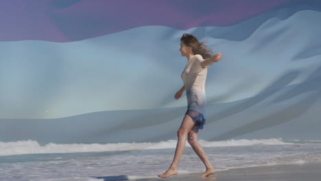 animación de la bandera de los países bajos sobre mujer caucásica en la playa