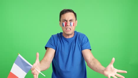 french supporter angry with the decision of the referee
