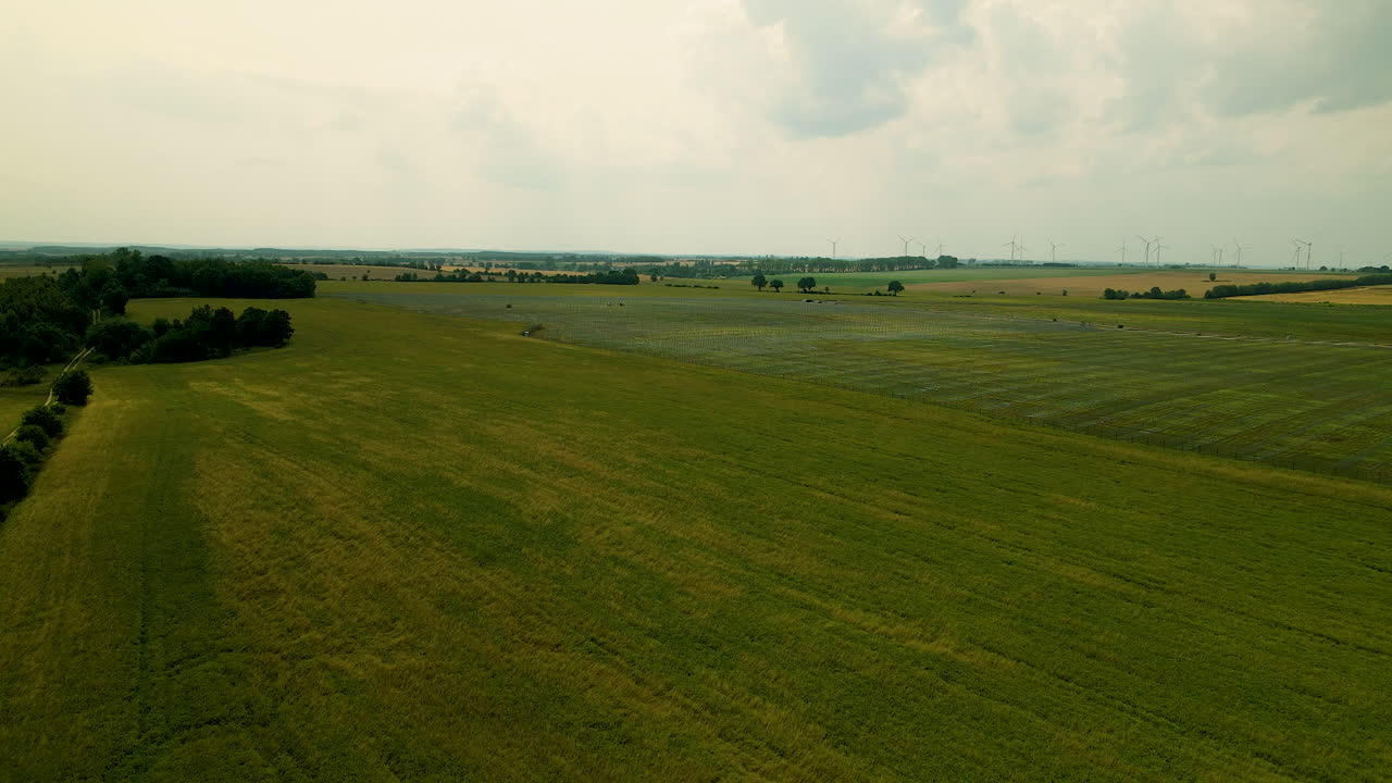 Aerial Green meadows fields for a solar farm biggest in Central Europe Zwartowo Pomerania, Poland