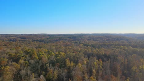 flying over tennessee countryside with blue skies in the background