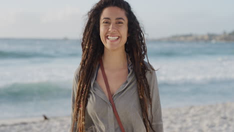 portrait of happy mixed race woman laughing enjoying summer vacation on beach cheerful female with dreadlocks hairstyle