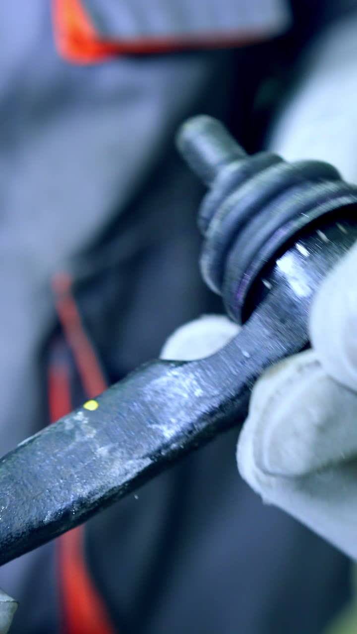 Worker in manufacturing plant. Steel production at the metallurgical plant. Vertical video