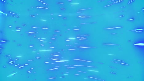 animación de un patrón de senderos de luz azul que se mueve en un bucle sin costuras sobre un fondo azul