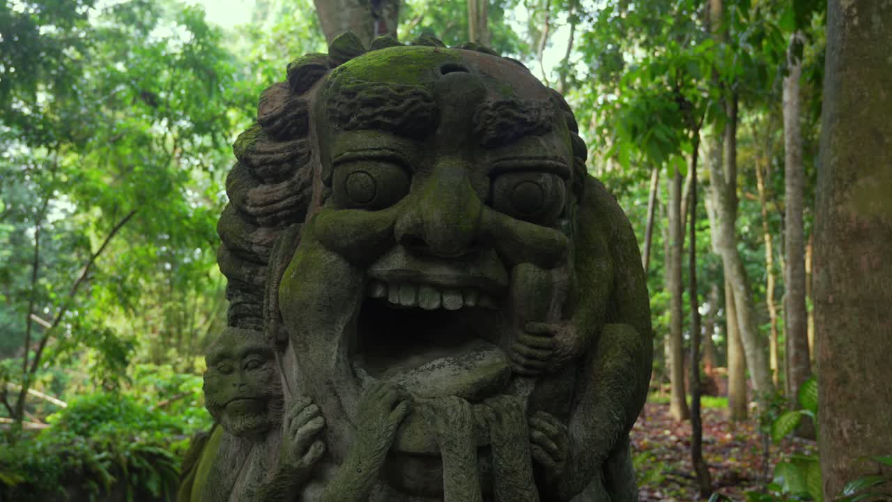 Balinese mythology Hanuman stone sculpture Bali Ubud Indonesia jungle Southeast Asia