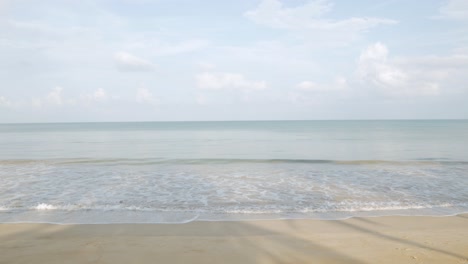 natural-sea-wave-water-with-foam-on-the-sandy-beauty-white-beach,-summer-beach-seascape