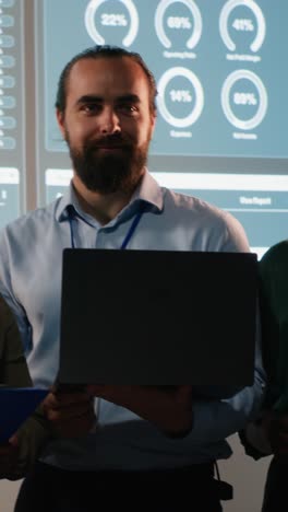vertical video portrait of team members discuss insight details and progress on a new project