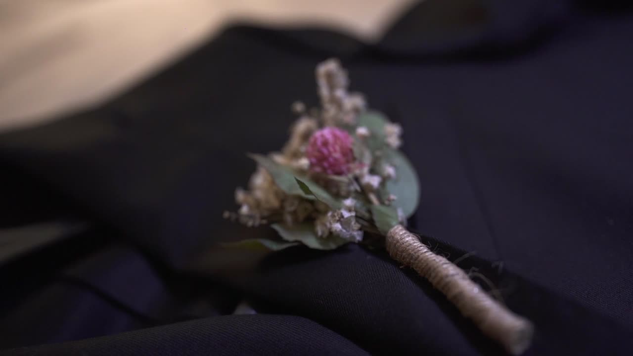 Wedding Decorative Details of a Rose in Man's Suit, Macro