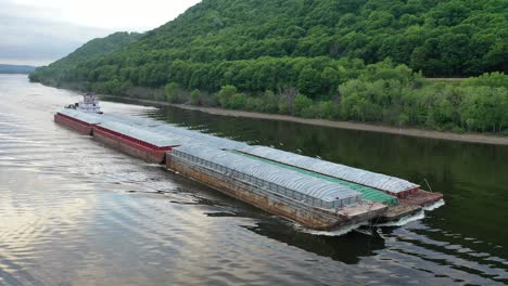 tugboat and barge on river