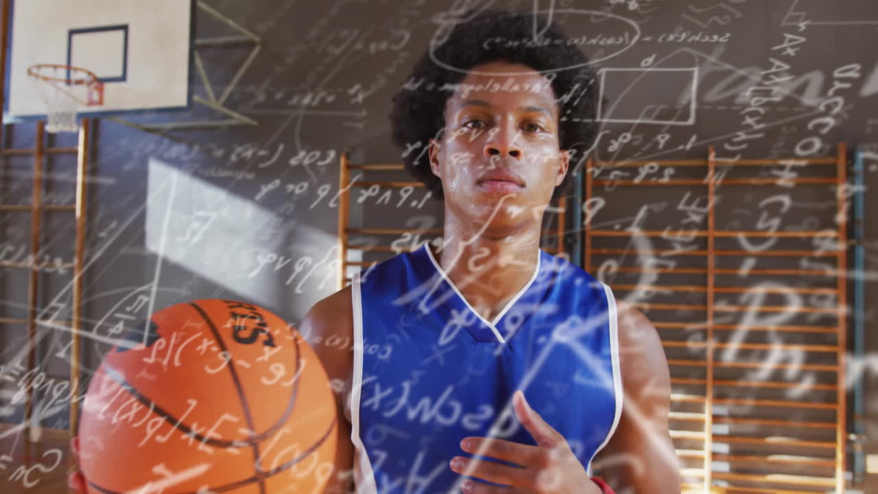 Male athlete holding basketball on gym court, showcasing animated math equations in education