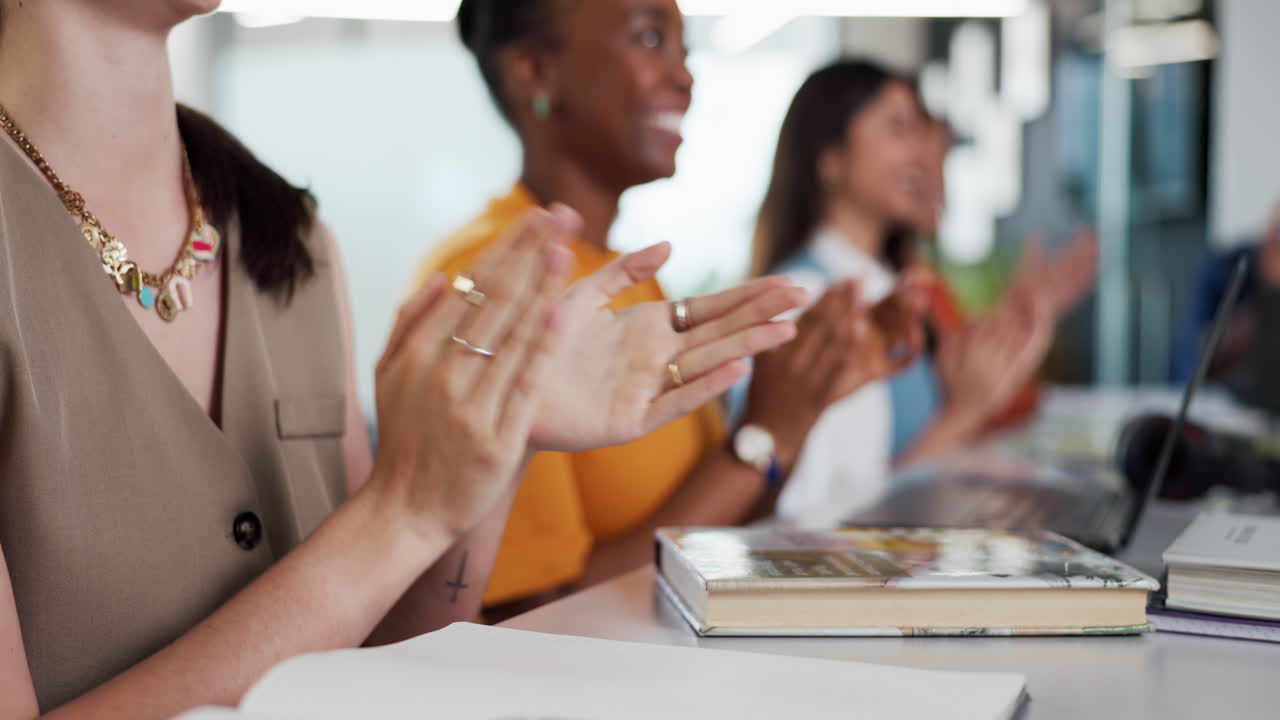 Diverse Group of Business People Clapping Hands in a Meeting