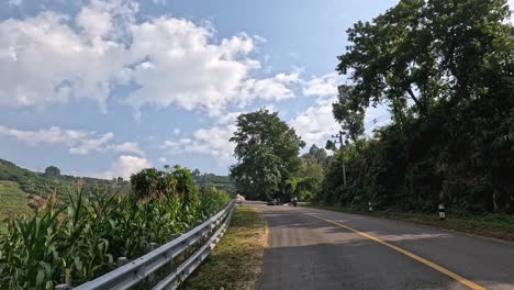 motorcycle journey along a winding rural road