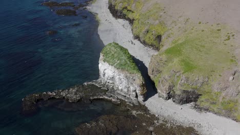 Aerial-Of-Under-The-Cliffs-Road-In-Svalvogavegur-Of-Westfjords-In-Iceland