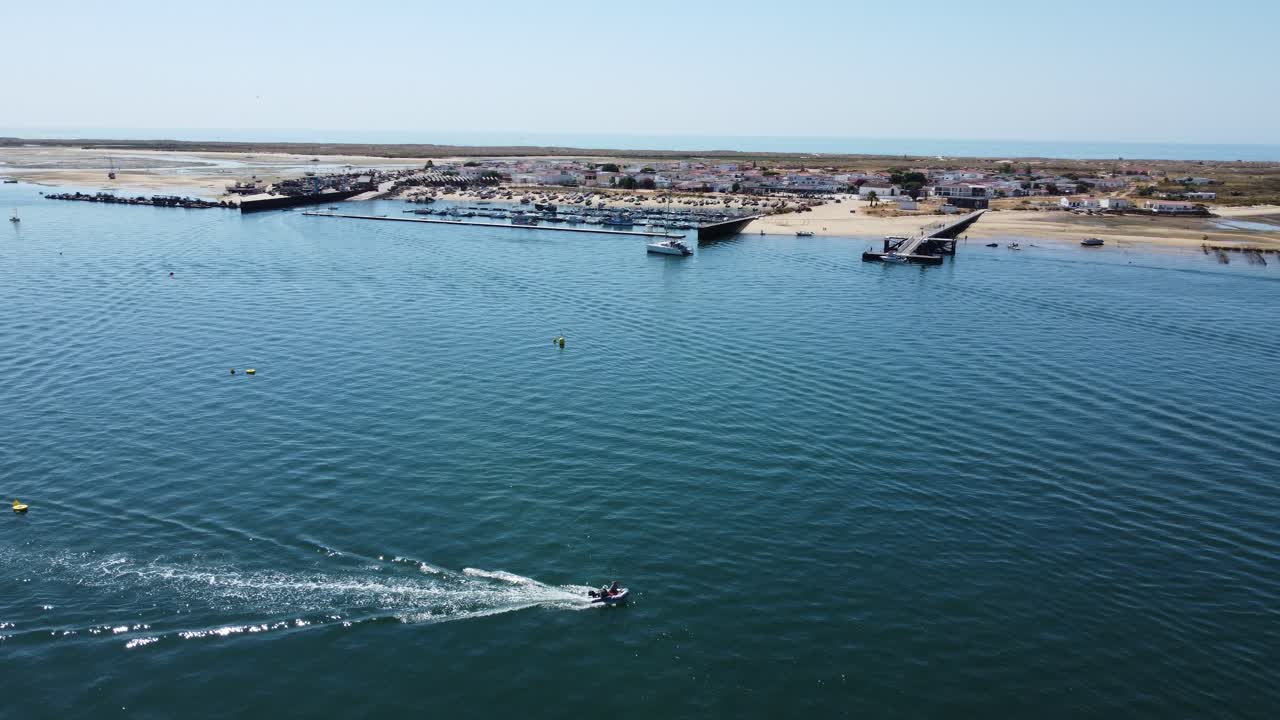 Drone approach over Ria Formosa towards the Culatra Island in Algarve, Portugal