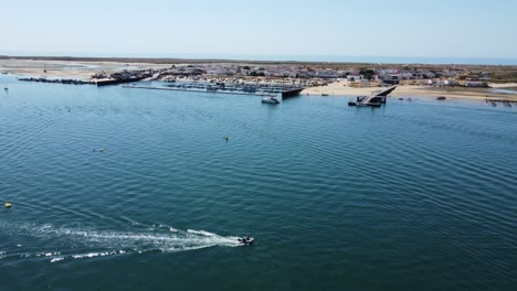 drone approach over ria formosa towards the culatra island in algarve, portugal