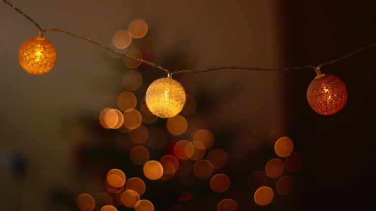 Marking end of holiday christmas season with dim lit lights