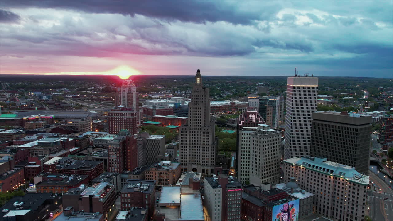 Beautiful aerial, time lapse over Providence city during sundown.