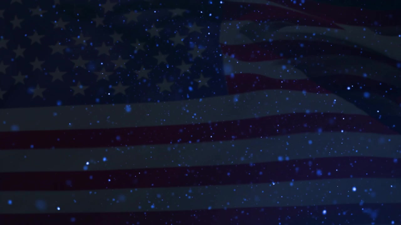 At start American flag rippling blue particles drifting then fading into dark blue background