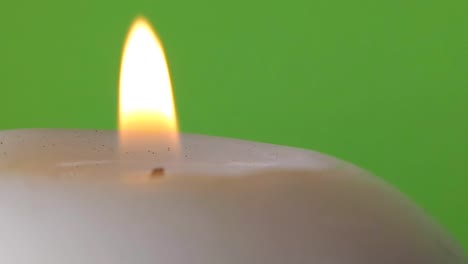 Lighter-Lighting-Candle-On-Green-Screen-Close-Up