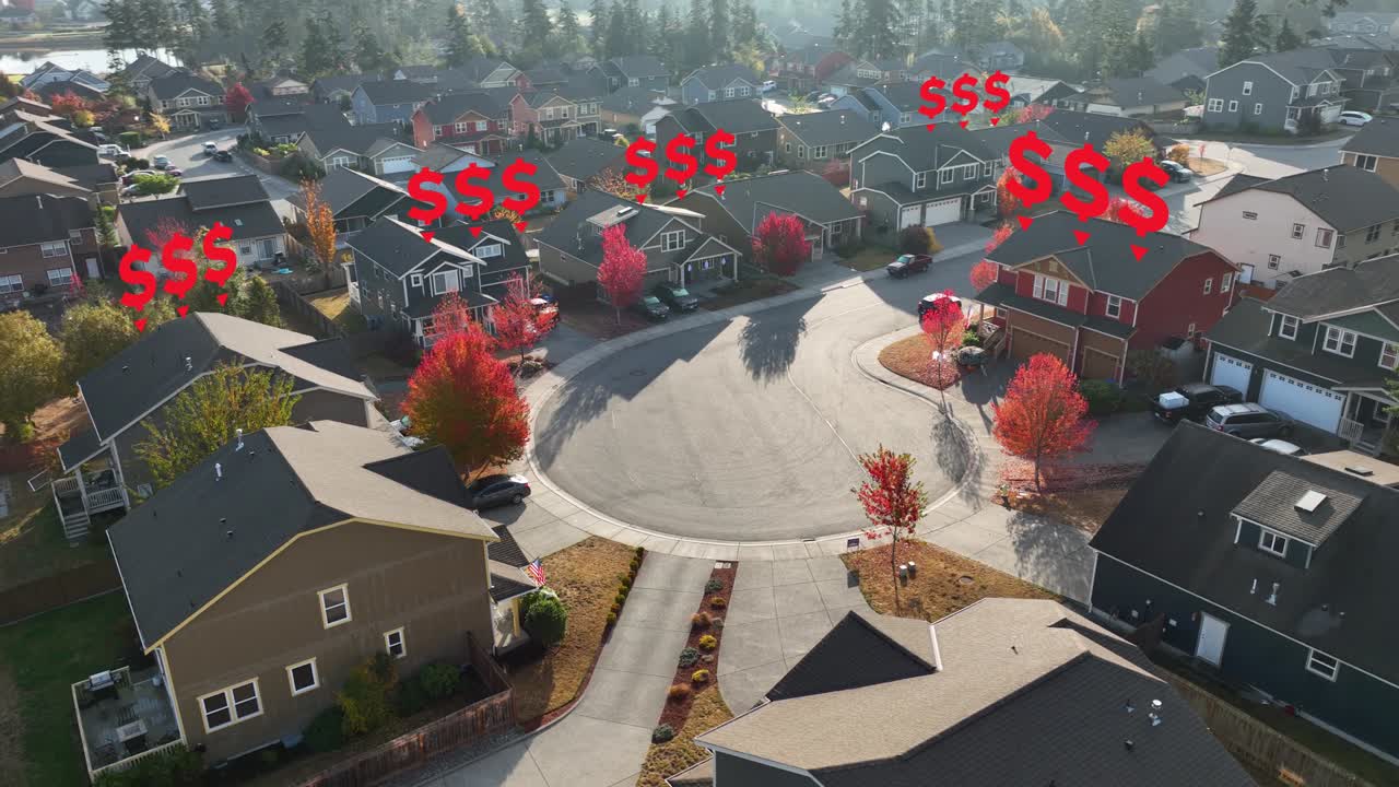 Aerial view of a suburban neighborhood with red dollar signs dropping, showing the real estate market's decrease