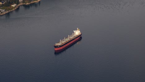 Bulk-Carrier-Sailing-Across-The-Water.-aerial-shot