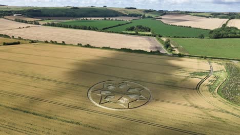 crop circle in a field in marten, wiltshire, uk - aerial drone shot