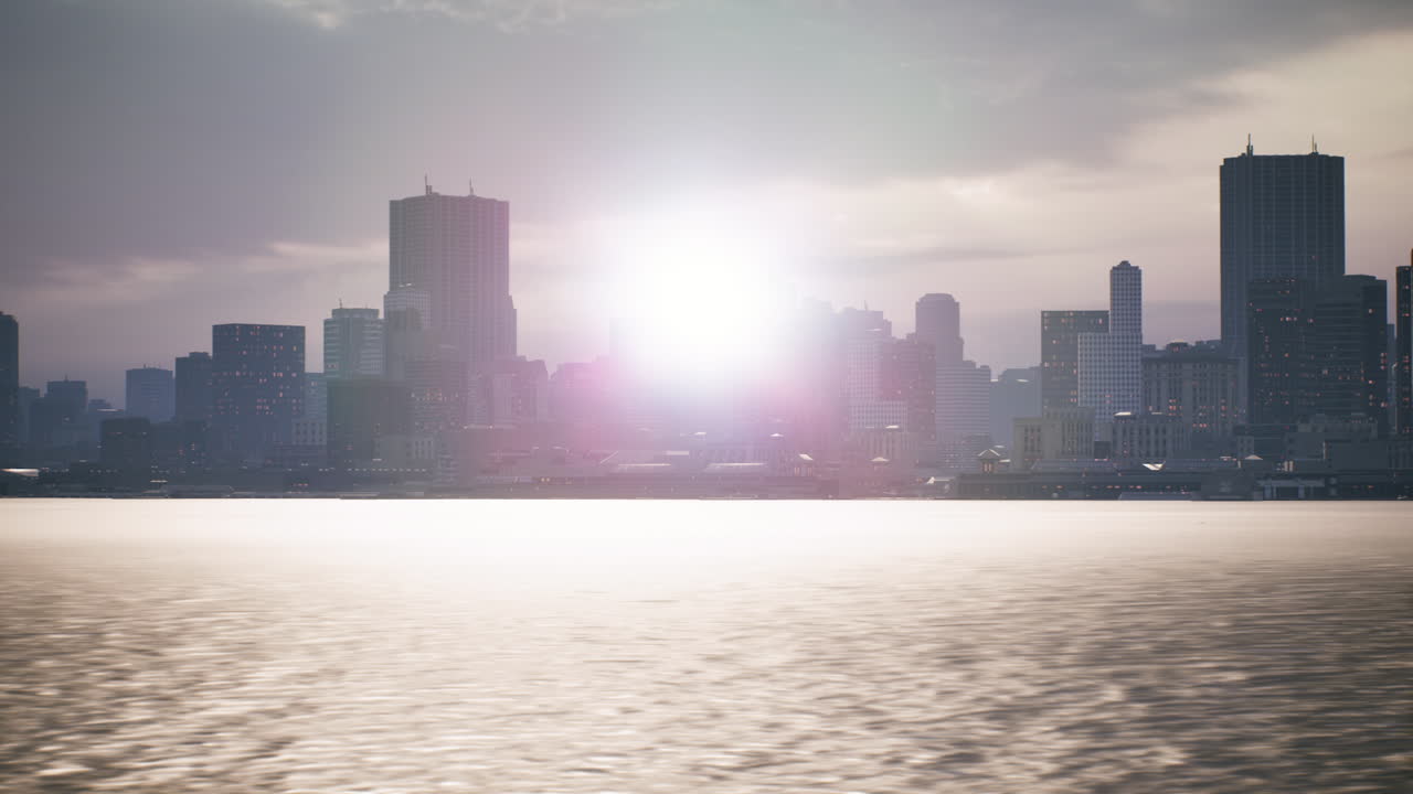 Golden sunset over a city skyline reflecting on the water
