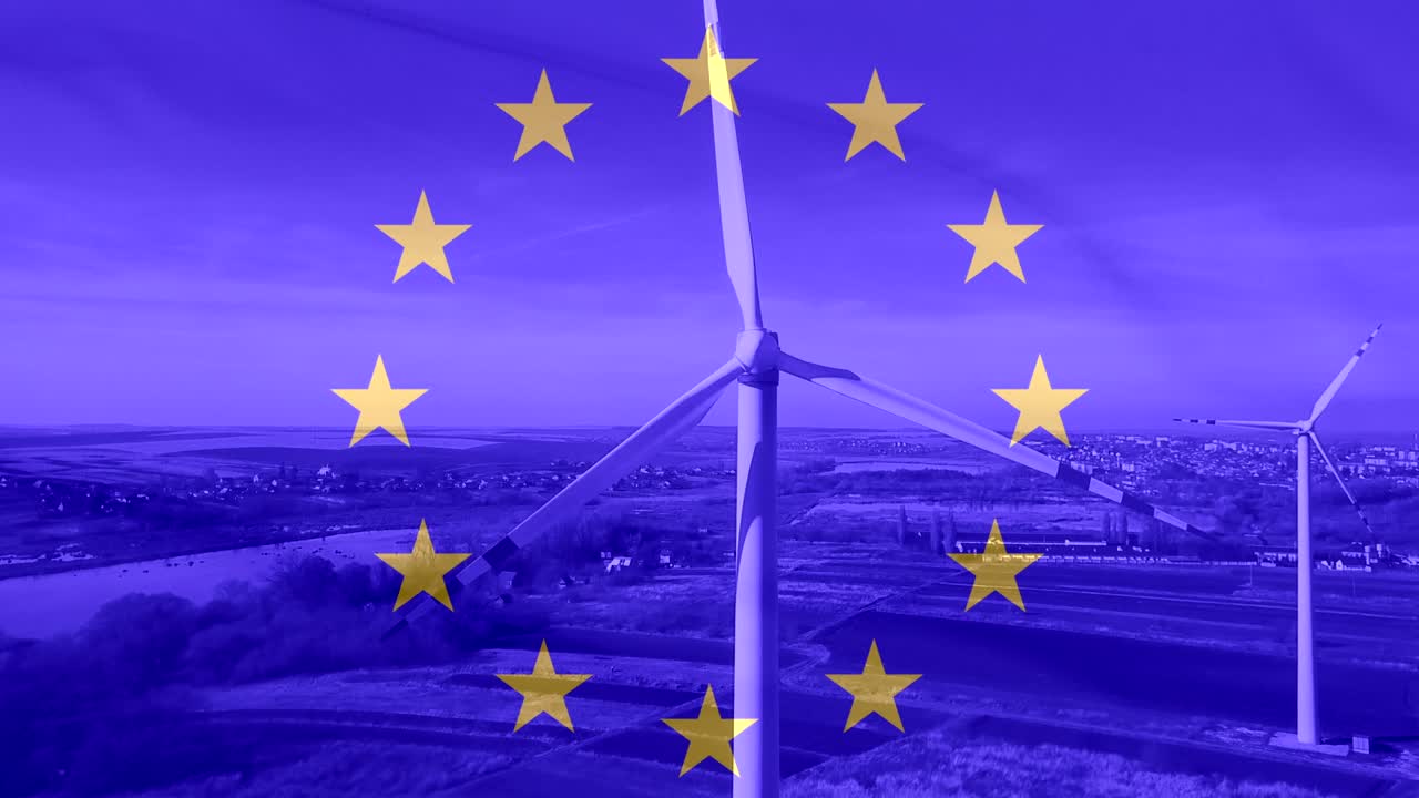 Massive wind turbine - aerial close up against the background of the EU flag