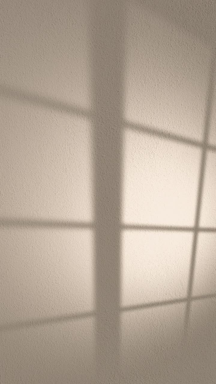 Sunlight Window Shadow Moving Across a Textured Wall
