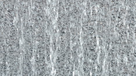 water running down a wall in dubai