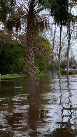 aftermath from hurricane storm surge, water flooding over roads, climate change